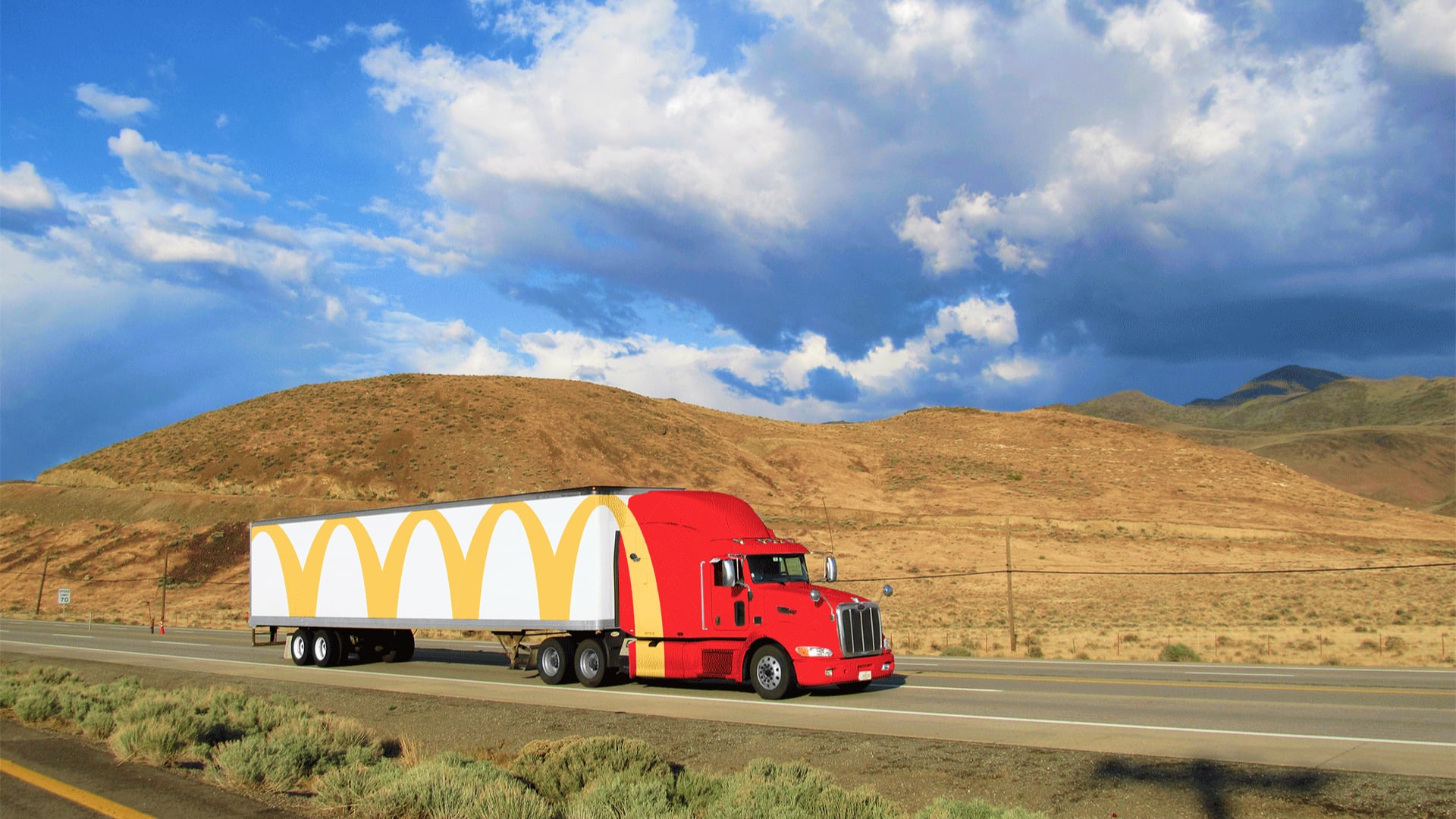 McDonald's truck driving on the road