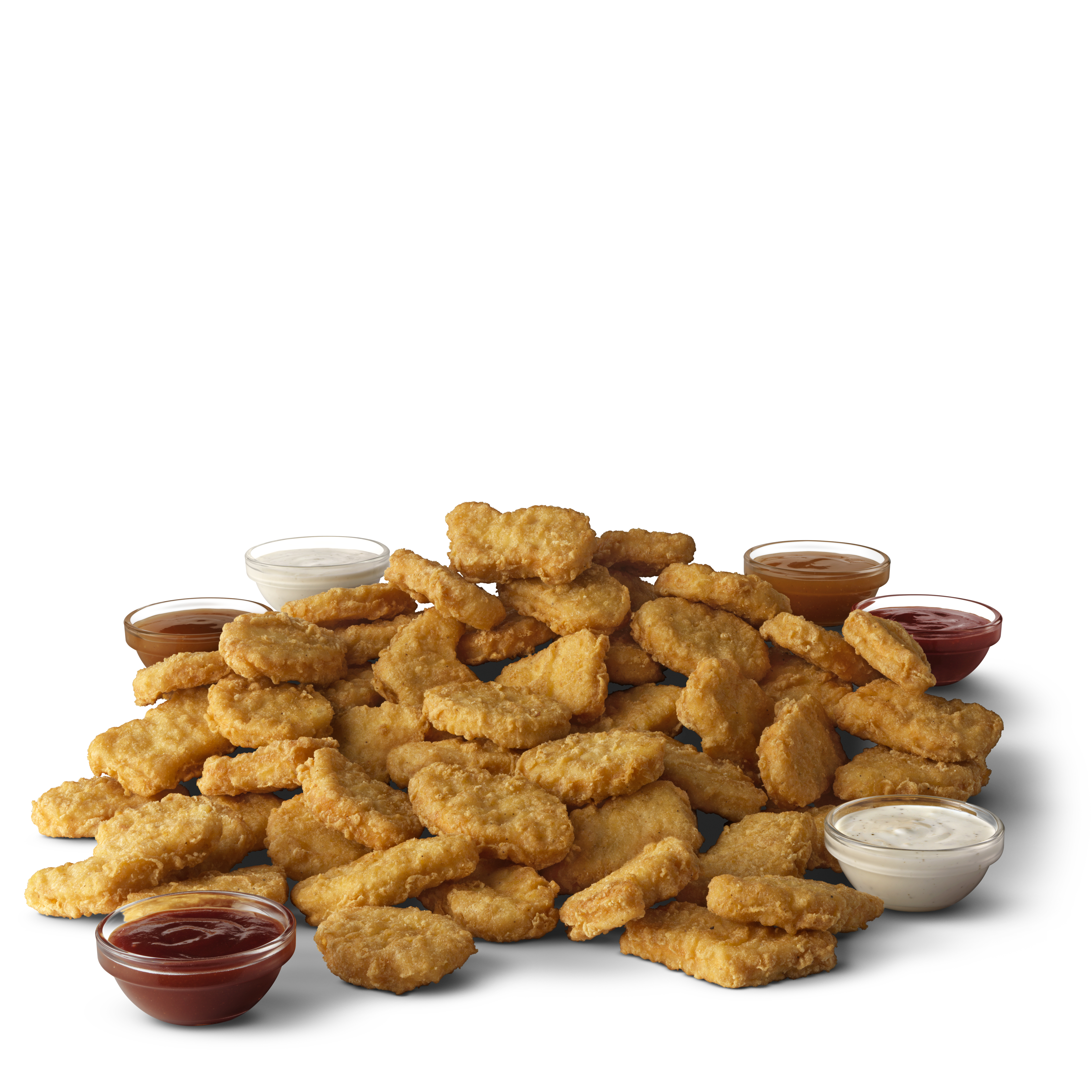 50 McDonald’s Chicken McNuggets® surrounded by McDonald’s Tangy BBQ and Creamy Ranch Sauces 