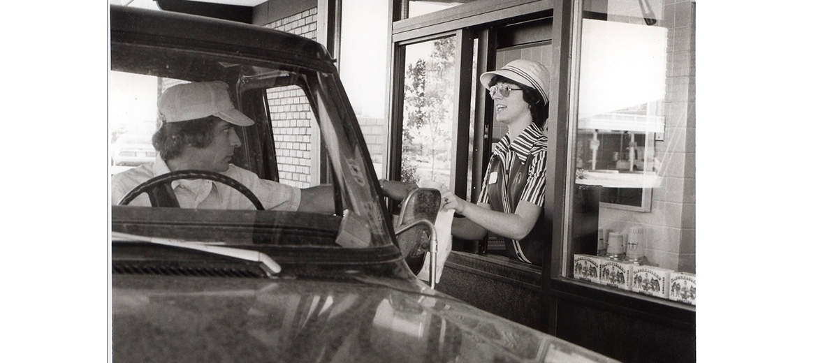 black and white photo of customer going through Drive Thru