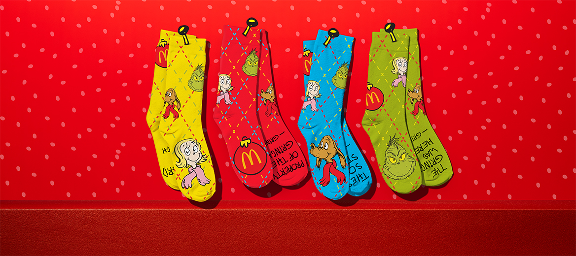 Four different Grinch socks 