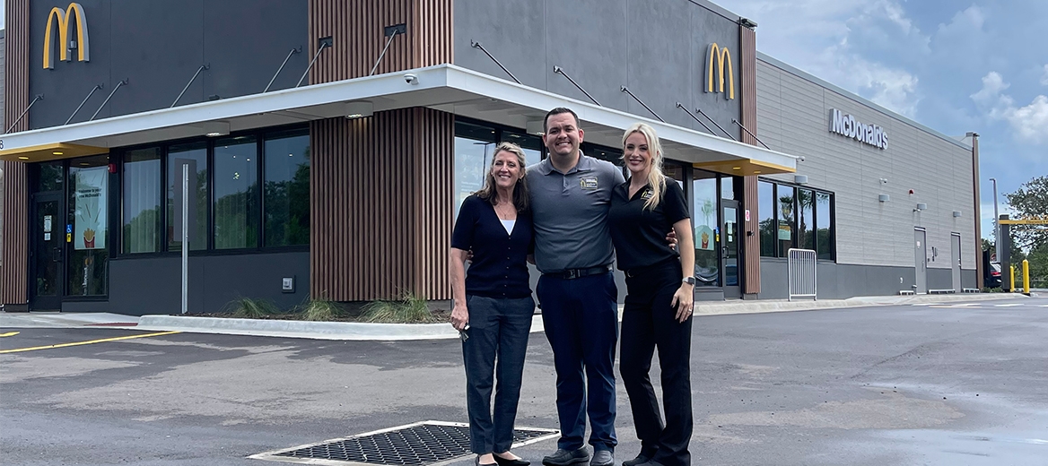 McDonald's crew in front of restaurant